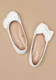 Missy White textured bow ballerinas