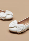 Missy White textured bow ballerinas