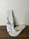 Aqua pineapple embossed flip flops