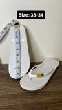 Aqua pineapple embossed flip flops