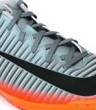 Nike grey stripe shoes with orange sole