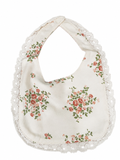 Juniors pink floral bib with button closure