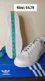 Adidas solid white perforated shoes (Box packaging)