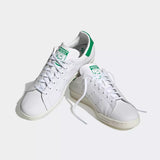 Adidas solid white perforated shoes (Box packaging)