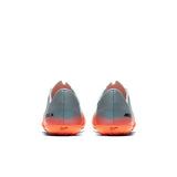 Nike grey stripe shoes with orange sole