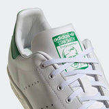 Adidas solid white perforated shoes (Box packaging)